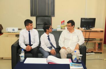 Interacts with students