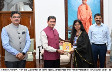 Presented Hindi Version of Thirukural Book to the students 1