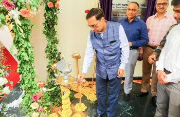 Shri Ajay Kumar Sharma, the then DGDE lightening the lamp