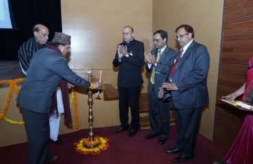 Shri Ajay Bhatt, Hon'ble Minister of State for Defence lighting the lamp