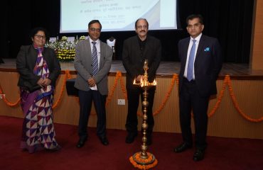 Dignitaries lighting the lamp