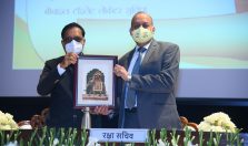 Shri Ajay Kumar Sharma, the then Director General Defence Estates presenting a memento to Dr Ajay Kumar, Defence Secretary;?>