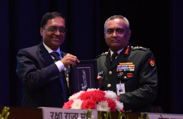 Defence Estates Day 2022: Chief of Army Staff General Manoj Pandey, PVSM, AVSM, VSM, ADC being presented a memento by Shri Ajay Kumar Sharma, the then Director General Defence Estates