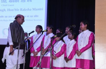 Shri Rajnath Singh, Hon'ble Raksha Mantri talking with kids