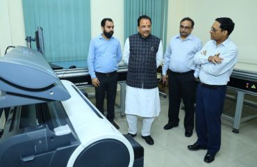 Shri Ajay Bhatt, Hon'ble Raksha Rajya Mantri visiting Scanning and Digitization Room at AU&RC, RSB Complex