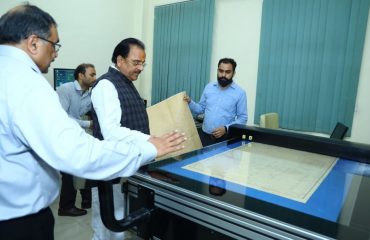 Shri Ajay Bhatt, Hon'ble Raksha Rajya Mantri visiting Scanning and Digitization Room at AU&RC, RSB Complex