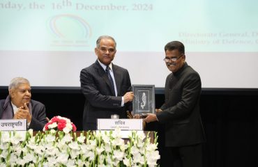 Dr. Niten Chandra, Secretary (ESW) receiving memento from Shri G S Rajeswaran, DGDE