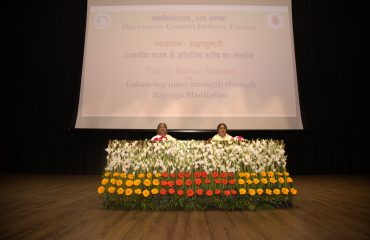 Representative of Brahma Kumaris at the stage before the beginning of session