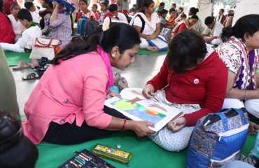 Divyangjan Participaing in Sit & Draw Competition