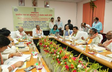 Sri P. C. Mohan, Chairman alongwith committee members of the committee Charing the meeting with NILD offcials