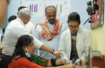 Dr. Lalit Narayan, Director explaing therapy technique Occupational Therapy Department to Chairman of the committee during the visit