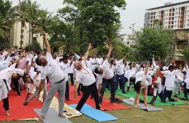 Sri T.V.K. Reddy, Director General (E), Press Information Bureau, Kolkata performing yoga with Divyangjan and other participants.