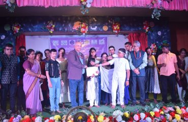 Dr. Lalit Narayan, Director, NILD, Kolkata and Dr. Ameed Equebal, Asstt. Director (Training) awarding the certificate and prize to Children with Disabilities