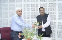 Sri V Uday Kumar, DDG HoG, GSTS and NDMI Divisions, NIC, New Delhi is being received.