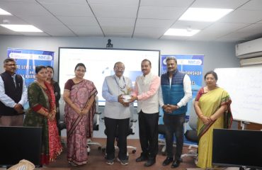 Dr. Pabitrananda Patnaik, DDG & ASIO presenting sapling to the esteemed guest Professor Narasingha Charan Panda, Vice Chancellor of Central University, Koraput.