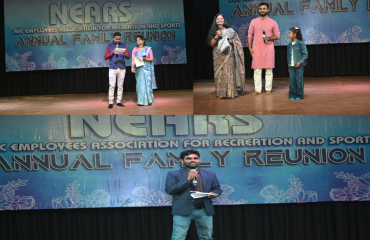 Anchors managing the stage and coordinating performances during the event.