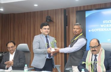 Shri Surendra Nath Behera, Scientist-F presenting sapling to Shri Soumya Sourav, Central Project Coordinator, Orissa High Court.