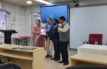 NIC Odisha’s tabletop calendar being presented to Shri Raminder Pal Singh.