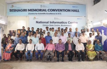 Group photograph of Dr. Rajesh Kumar Pathak, DDG & State Coordinator, with the officers and staff of NIC and NIU Odisha.