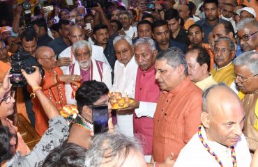 His Excellency performing aarti rituals.