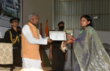His Excellency felicitating brave women at the event.
