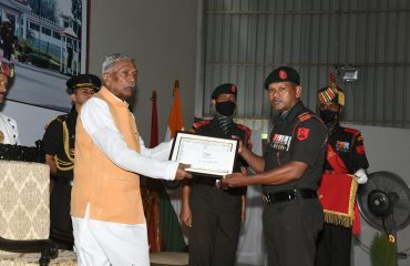 His Excellency felicitating the Soldier.