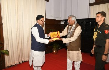 His Excellency presenting the memento to Honorable Law Minster, Dr. Shamim Ahmad.