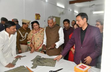 His Excellency observed the stitched clothes displayed at the stalls.