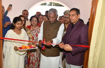His Excellency cutting the ribbon.