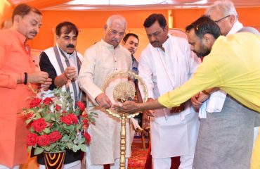 His Excellency performing the ritual of Deep Prajwalan at the event.