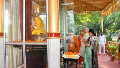 His Excellency along with Honorable Lady Governor offering prayers to Lord Buddha.