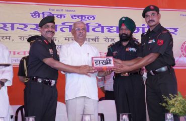 His Excellency presenting rakhi for jawans.