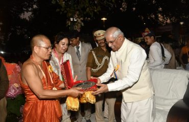Honorable Governor being welcomed at the event by the monks.