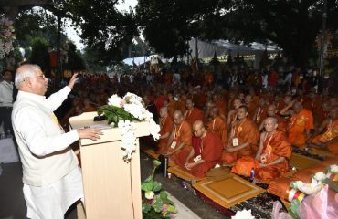 Honorable Governor being addressing the people at the event.