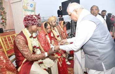 Honorable Governor meeting the newly wed couple.