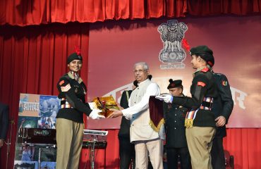 Honorable Governor presenting memento.