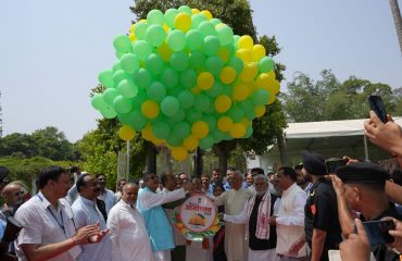 Honorable Governor with other dignitaries releasing air balloons.