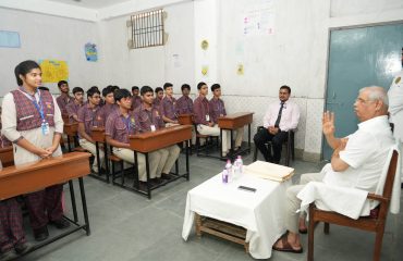 Honorable Governor interacting with students.