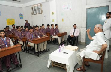 Honorable Governor interacting with students.