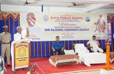 Honorable Governor addressing teachers and students at the event.