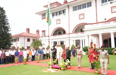 Honorable Governor saluting the National Flag.