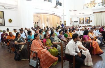 Professor and students attending the samvaad program.