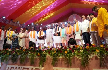 Honorable Governor at the event with other dignitaries.