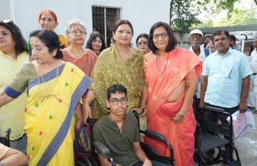 Lady Governor distributed wheel chairs and tricycles.