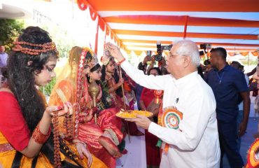 Honorable Governor worshipping the nine forms of Goddess.