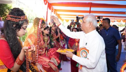 Honorable Governor worshipping the nine forms of Goddess.