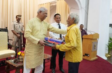 Honorable Governor distributing gifts among Raj Bhavan staffs.