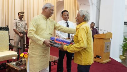 Honorable Governor distributing gifts among Raj Bhavan staffs.