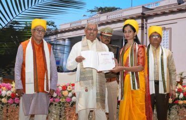 Honorable Governor felicitating the toppers.