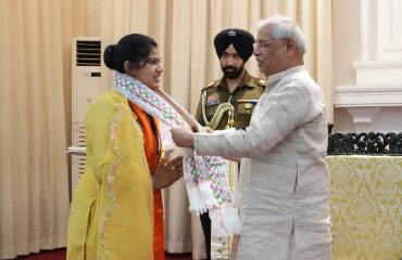 Honorable Governor felicitating students.